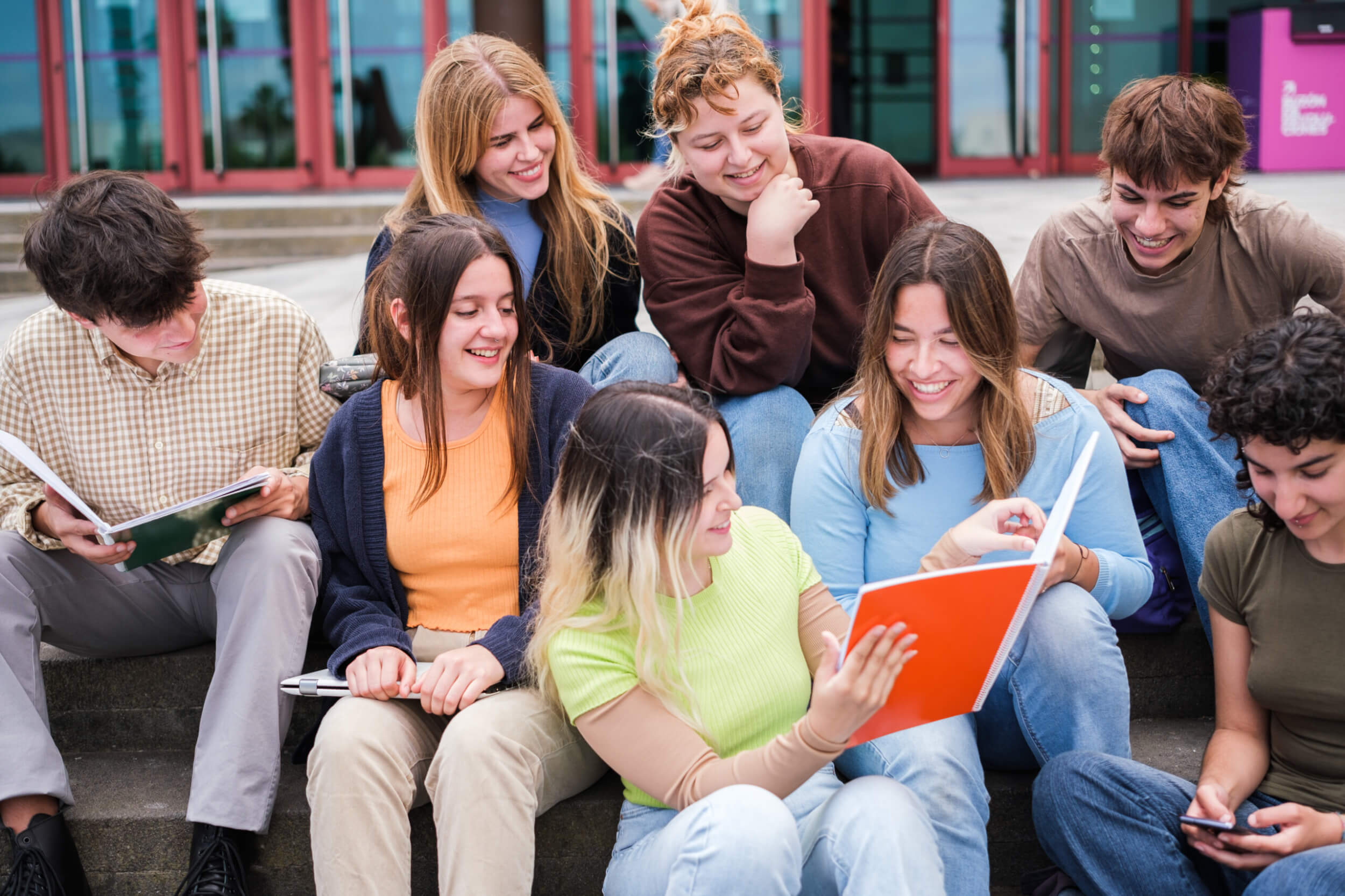 group of students checking books right on the stai 2026 01 07 05 48 31 utc scaled